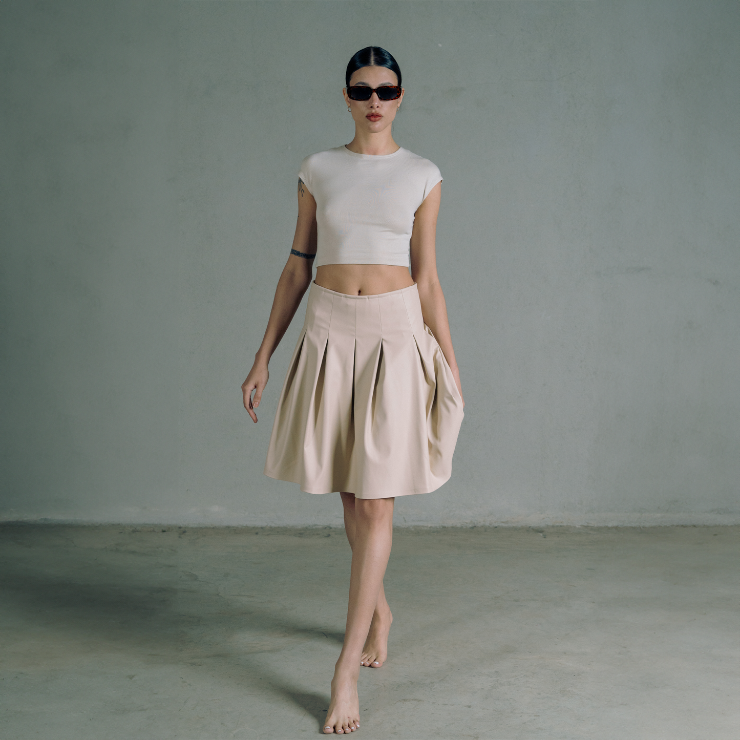 Creamy pleated leather skirt
