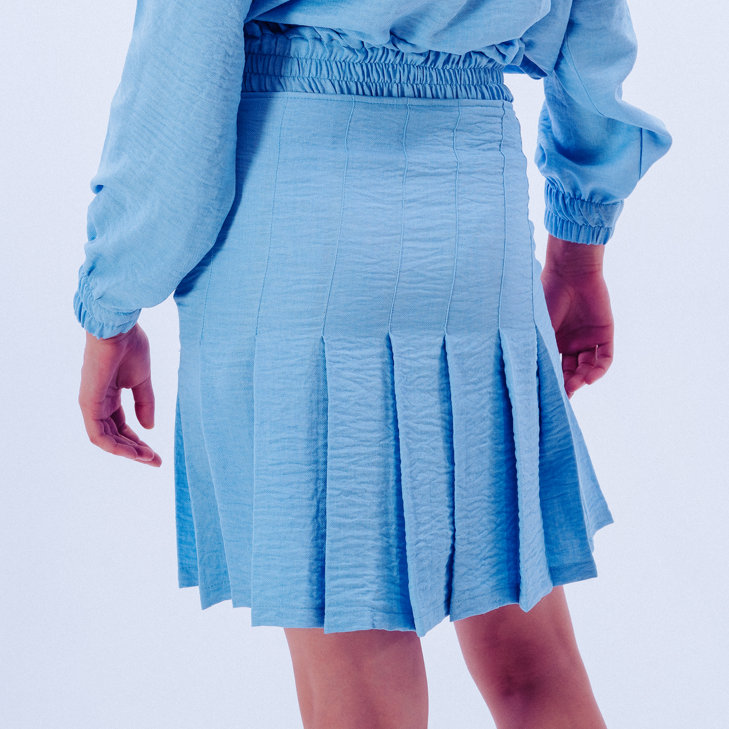 Signature Mini Baby Blue Pleated Skirt